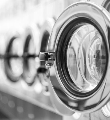 Side Shot of a Commercial Dryer at a Laundromat